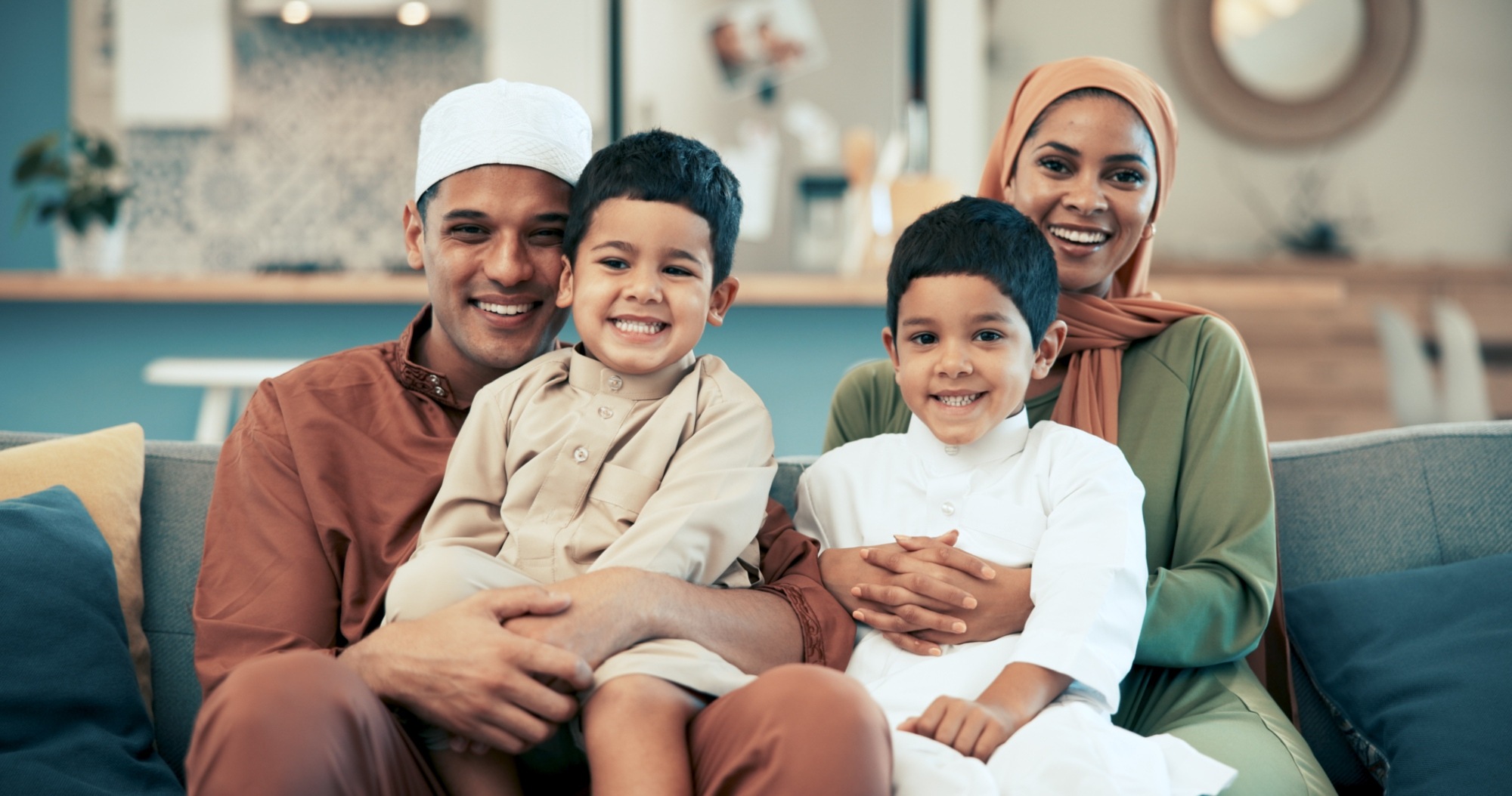 muslim-family-happy-and-portrait-on-sofa-in-home-2024-07-11-20-56-40-utc (1)